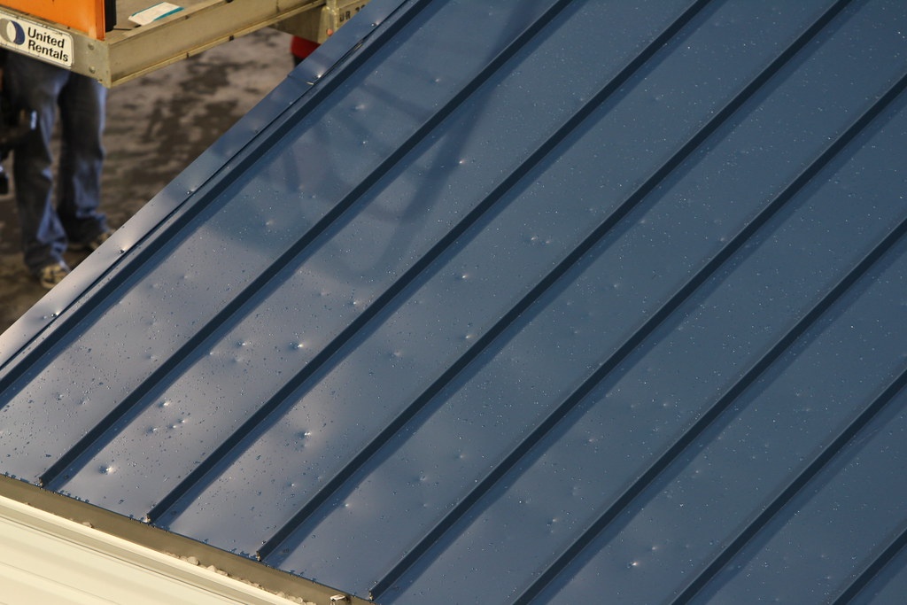 Hail Damage Repair Northeast Ohio | Roof Gutter Now 7 Hail-dented metal roof and gutters
