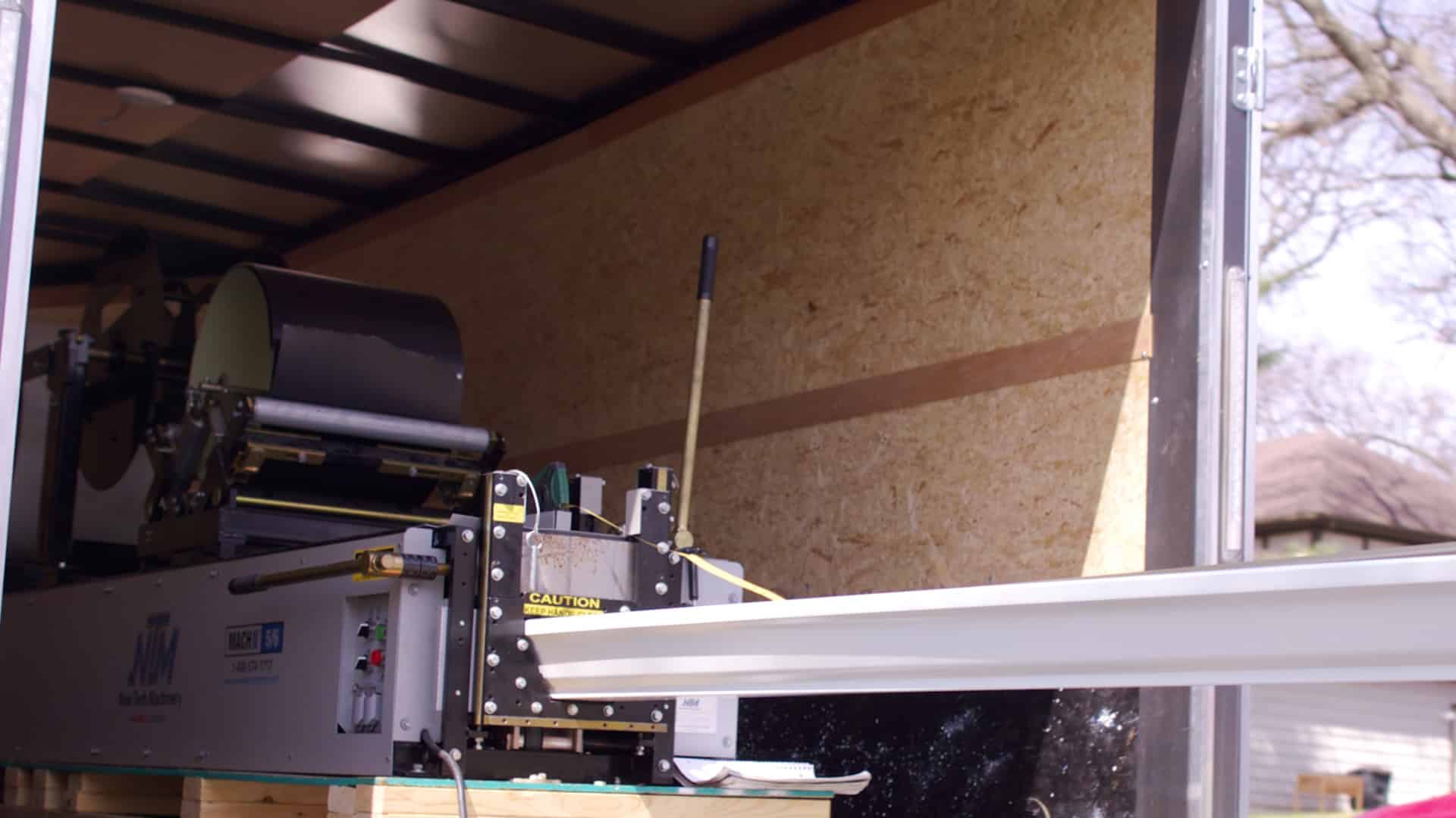 On-site gutter fabrication machine