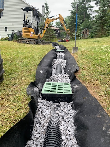 Underground downspout drainage installation Northeast Ohio