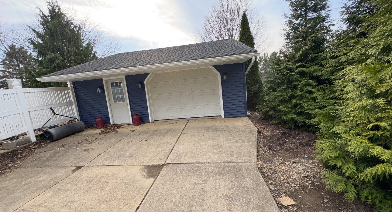 Garage after insurance approved siding replacement