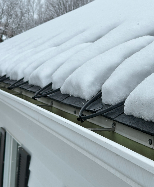 Heated Roof Cables | Roof Gutter Now 2 Heat cables keeping roof edge open through snow