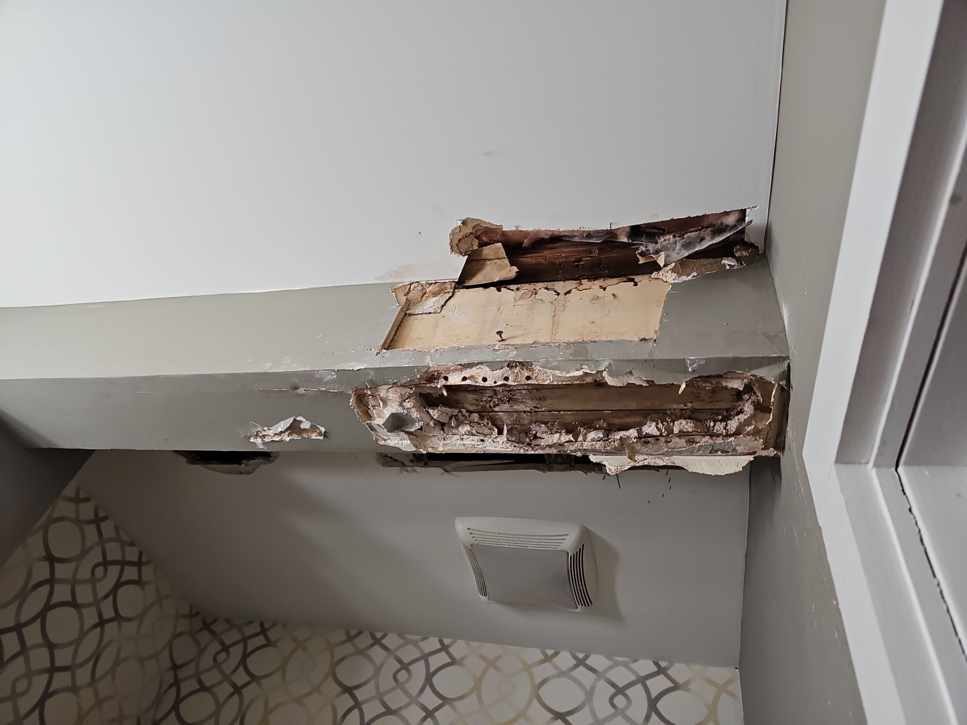 Ice Dam Removal Park City UT | Roof Gutter Now 9 image shows severe structural damage to a residential ceiling caused by ice dam-related water intrusion. The in Park City, UT