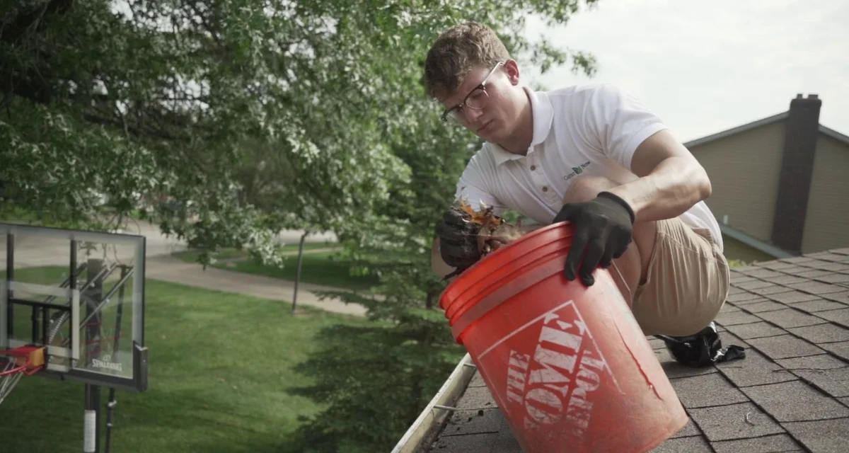Nathaniel Davis cleaning gutters in Northeast Ohio
