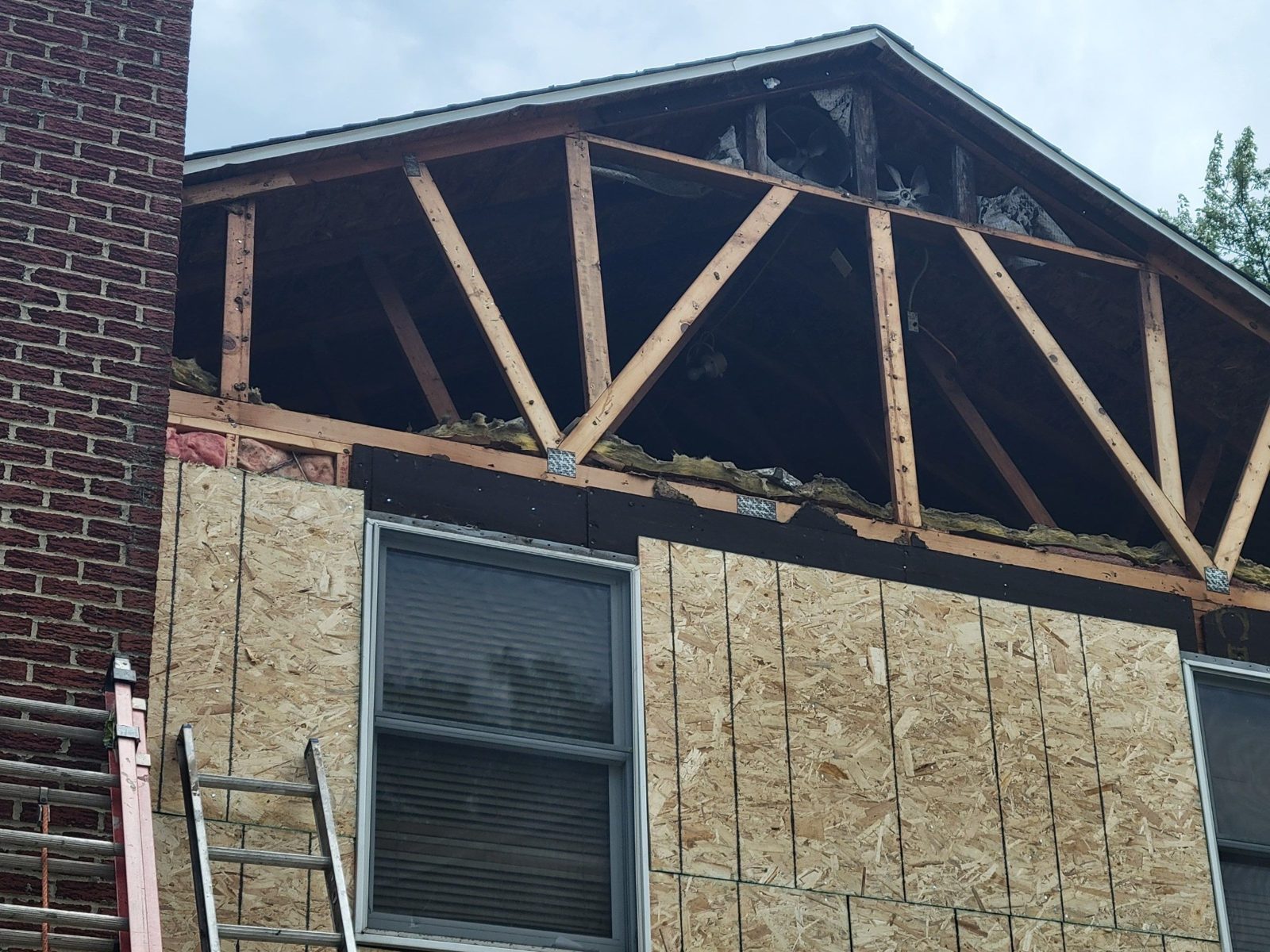 Roof Installation | New Construction & Garages | Roof Gutter Now 1 Roof framing and OSB sheathing on new structure