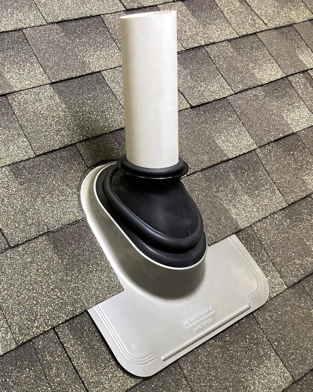 Roof Flashing Repair | Roof Gutter Now | OH PA NY 2 Pipe boot flashing with rubber collar on shingle roof
