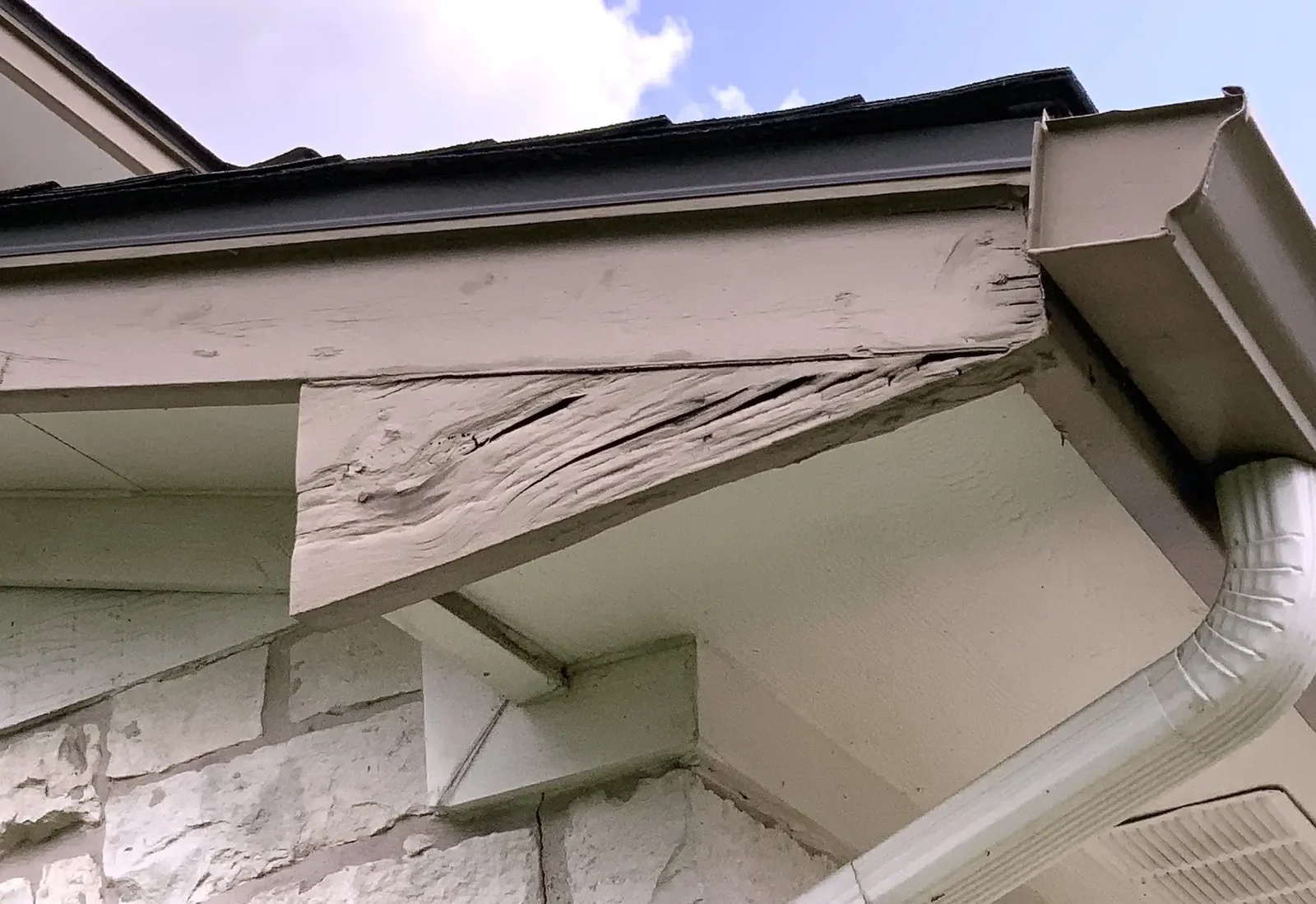 Damaged wooden fascia and trim showing rot and deterioration along the roofline in Toledo, OH